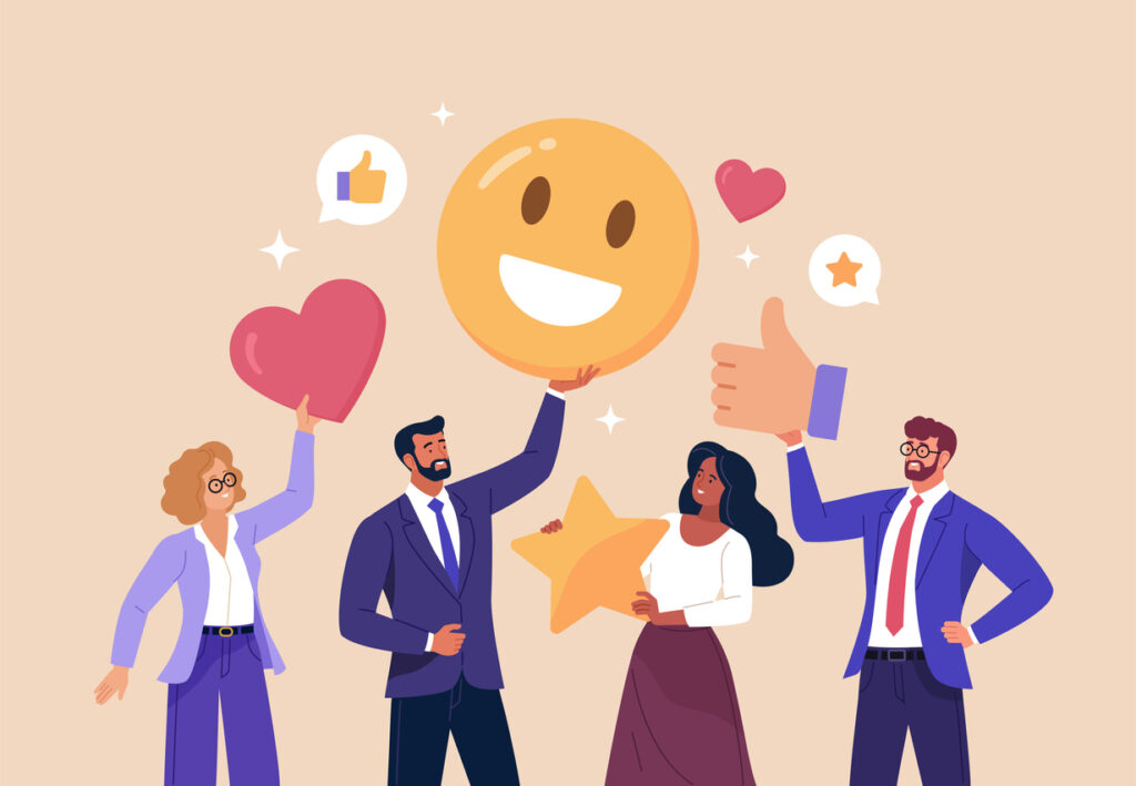 Four people celebrate positivity and appreciation, holding oversized symbols of happiness, love, support, and recognition (hearts, smiley faces, thumbs up)