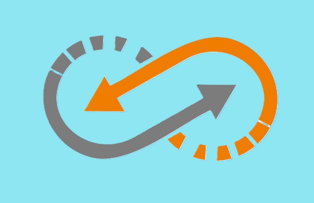 An orange and gray infinity loop with opposing arrows on a bright turquoise background, symbolizing continuous cycles, contrasting perspectives, and interconnected processes.